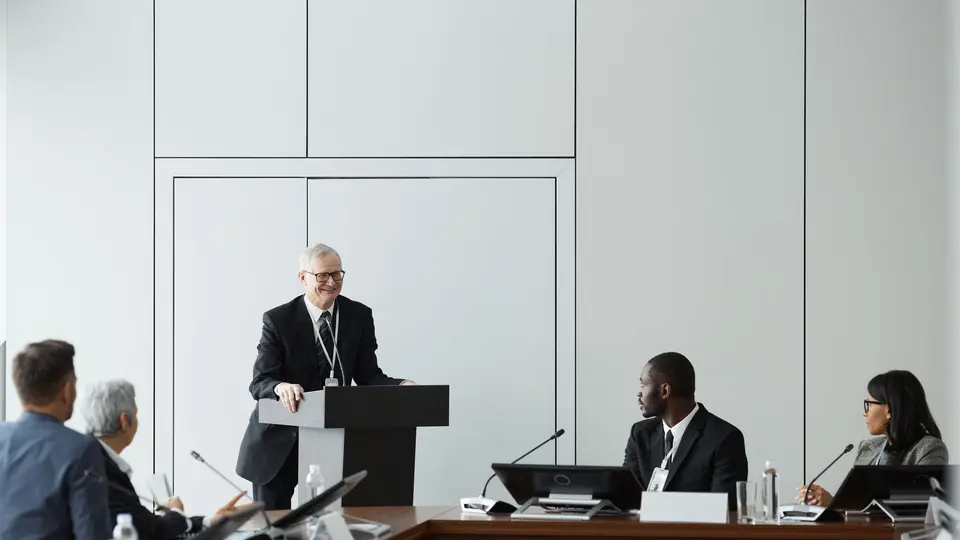 Young professional excelling during competitive corporate boardroom presentation