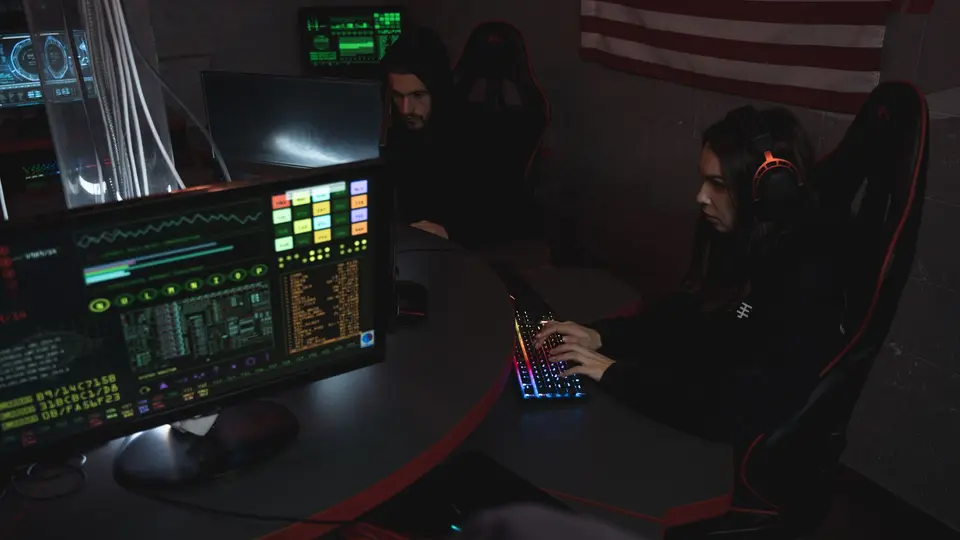 Massive command center showing cybersecurity incident response team containing a network breach