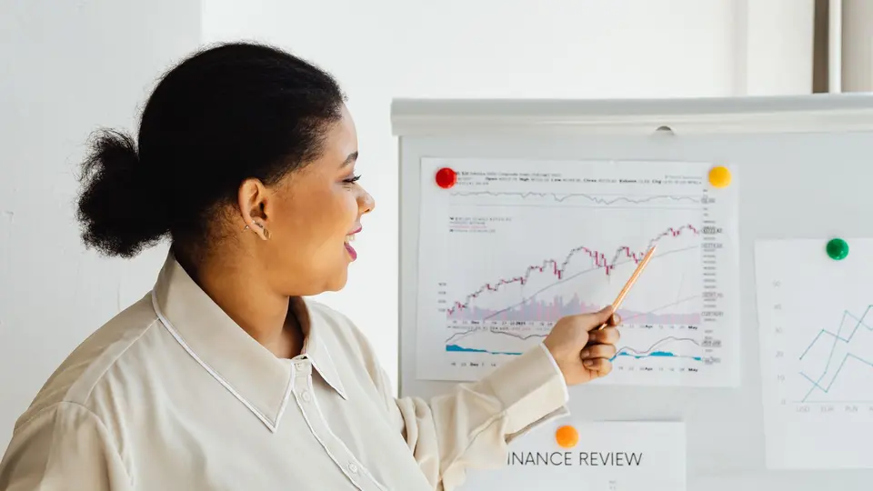 Marketing director interpreting neuro-metric response data on interactive tablet