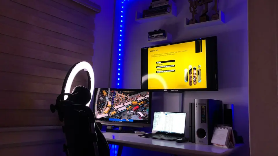 Dedicated home office setup with laptop, monitor, and clean desk workspace